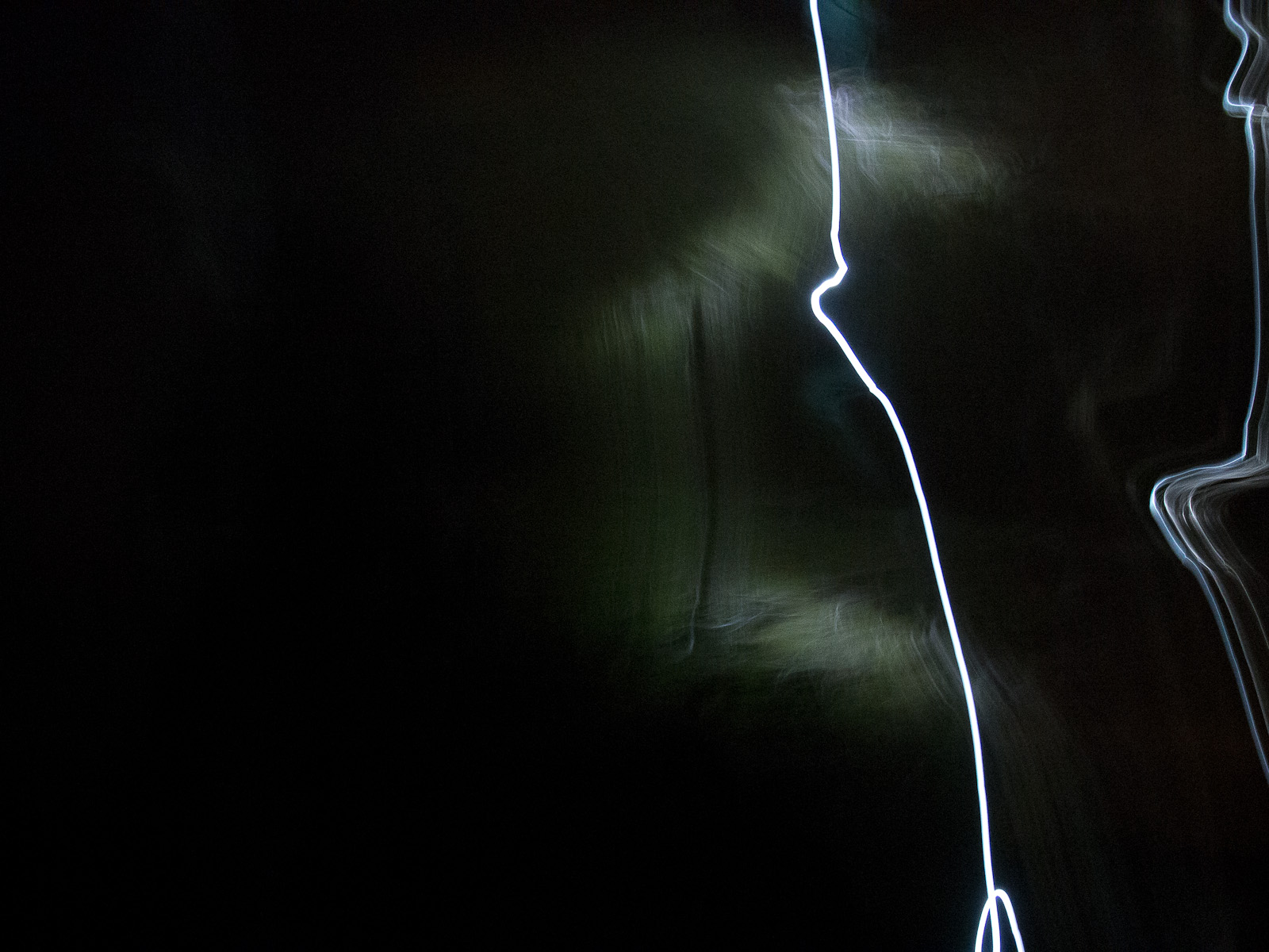 Walking amongst the trees in a dark autumn night.